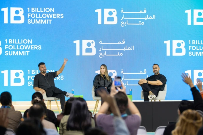 Speakers on stage at 1 billion followers summit event.